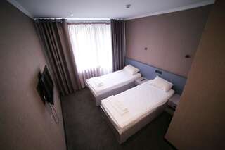 Отель Olympica Hotel Алматы Стандартный двухместный номер с 1 кроватью или 2 отдельными кроватями-5